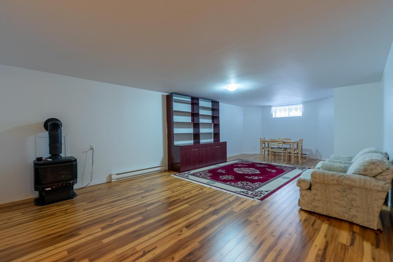 Basement - 5585 Rue Anthony, Brossard, QC - Indoor Photo Showing Other Room