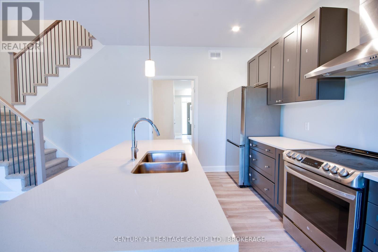1261 Max Crescent, Kingston (City Northwest), ON - Indoor Photo Showing Kitchen With Double Sink