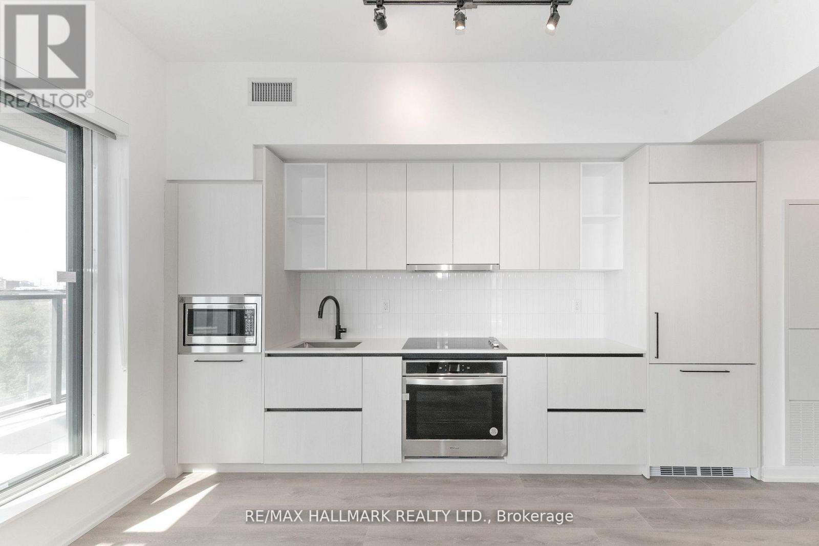 Designer Kitchen W Full Size Panelled Appliances - 503 - 1285 Dupont Street, Toronto, ON - Indoor Photo Showing Kitchen