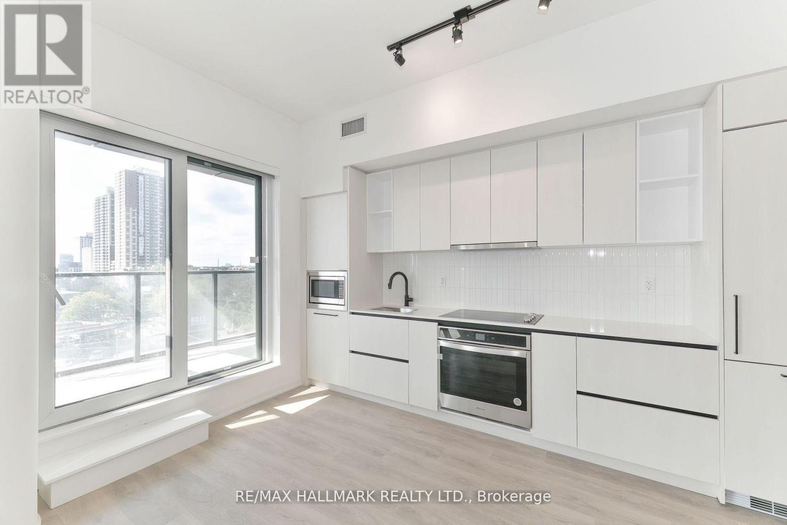 Designer Kitchen W Full Size Panelled Appliances - 503 - 1285 Dupont Street, Toronto, ON - Indoor Photo Showing Kitchen