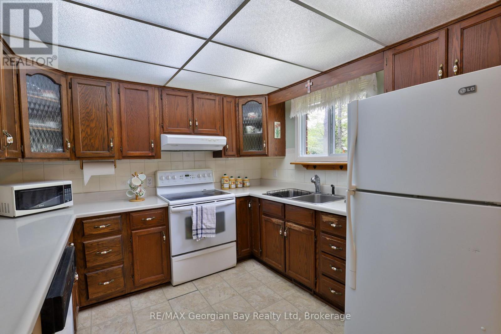 1 Lindale Avenue, Tiny, ON - Indoor Photo Showing Kitchen With Double Sink