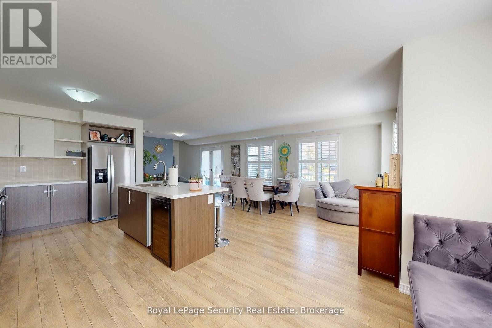 bright and open walk out to balcony for bbq's - 55 Golden Springs Drive, Brampton, ON - Indoor Photo Showing Kitchen With Stainless Steel Kitchen