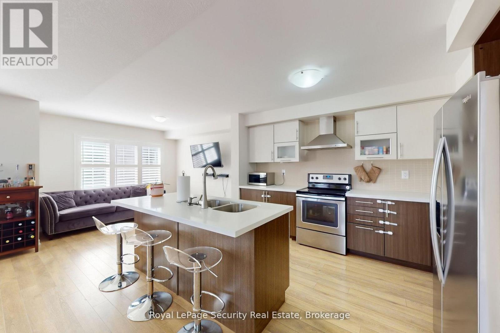 quartz counter tops and SS appliances - 55 Golden Springs Drive, Brampton, ON - Indoor Photo Showing Kitchen With Stainless Steel Kitchen With Double Sink