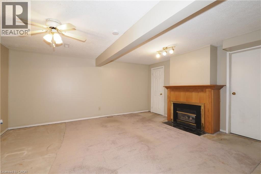 255 Northlake Drive Unit# 27, Waterloo, ON - Indoor With Fireplace