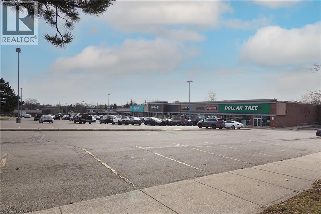 View of uncovered parking lot - 255 Northlake Drive Unit# 27, Waterloo, ON - Outdoor With View