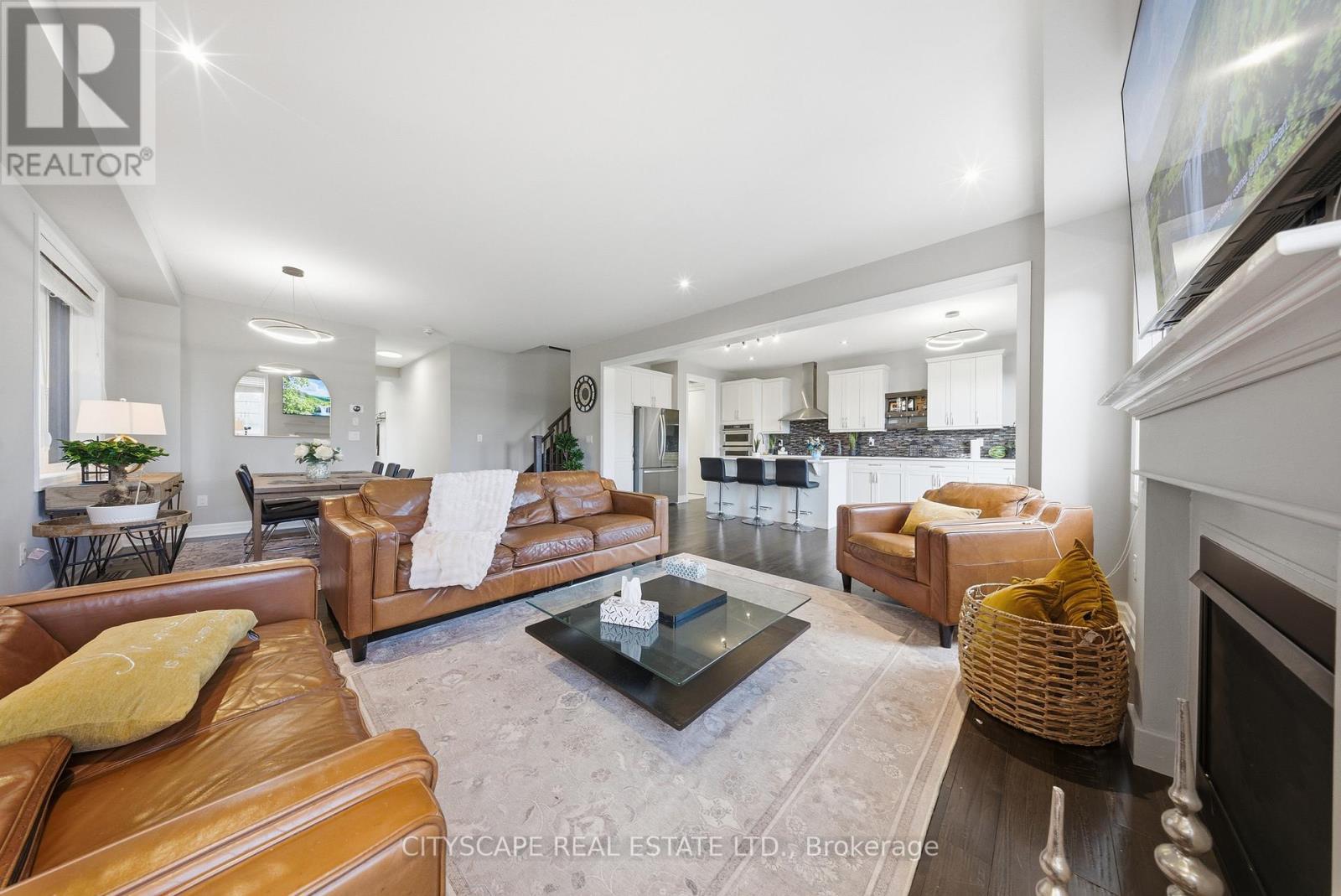 28 Celano Drive, Hamilton, ON - Indoor Photo Showing Living Room With Fireplace