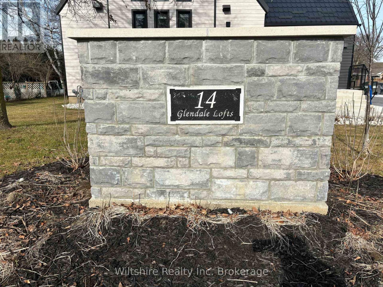 4 - 14 Glendale Drive, Tillsonburg, ON - Outdoor With Fireplace