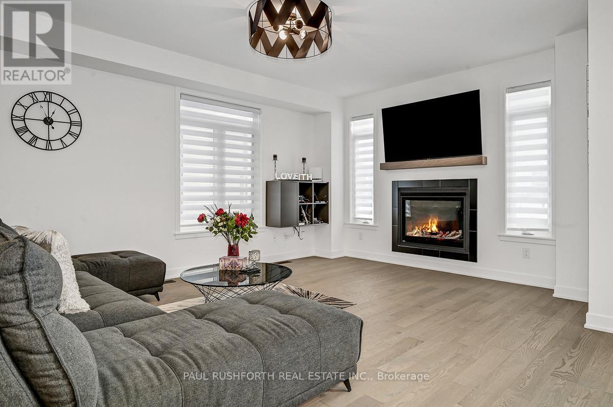 Living Room - 28 Mendoza Way, Ottawa, ON - Indoor Photo Showing Living Room With Fireplace