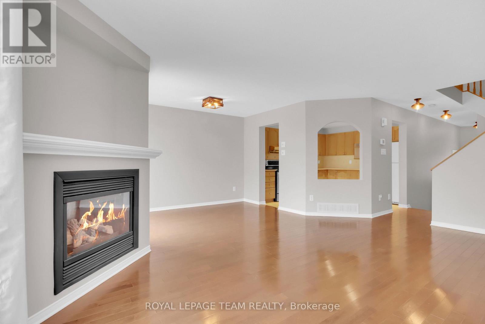 Living Room - 70 Mcbrien Street, Ottawa, ON - Indoor Photo Showing Living Room With Fireplace