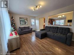 Living room view looking towards kitchen beyond -