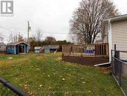 view of the fenced in back yard -