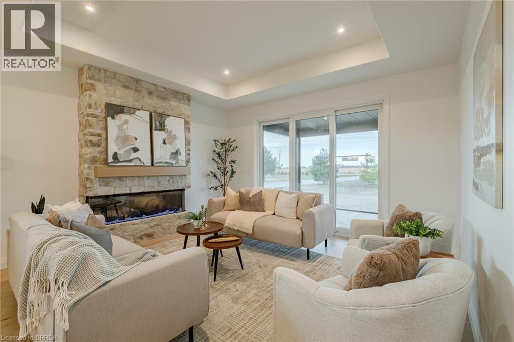 51 Wild Rose Lane, St. Williams, ON - Indoor Photo Showing Living Room With Fireplace