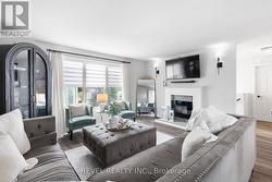 Upper Living Room W/Fireplace -