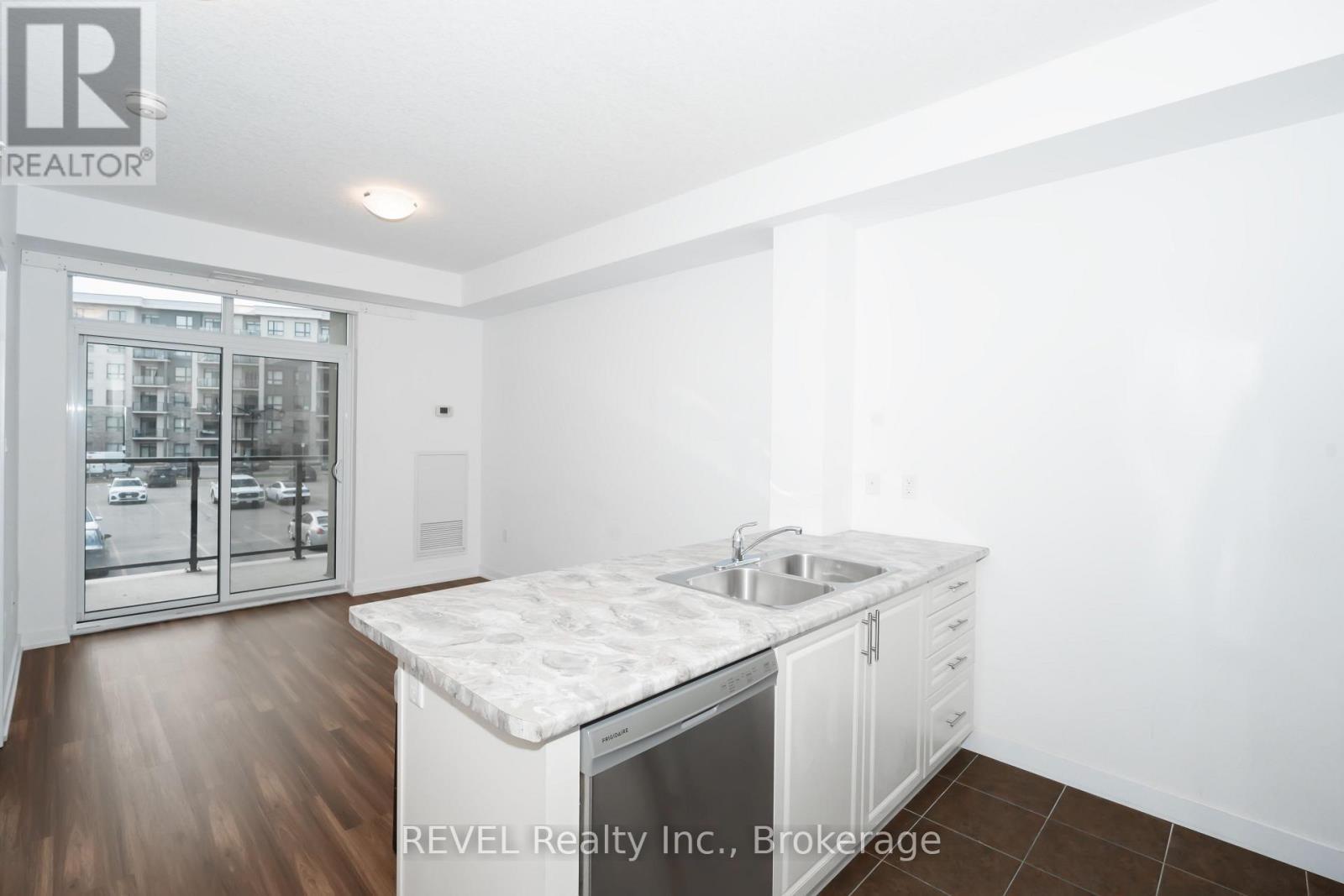 228 - 101 Shoreview Place, Hamilton (Lakeshore), ON - Indoor Photo Showing Kitchen With Double Sink