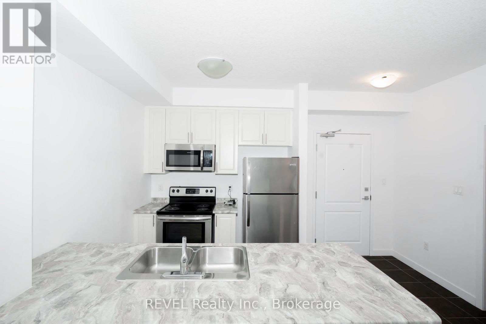 228 - 101 Shoreview Place, Hamilton (Lakeshore), ON - Indoor Photo Showing Kitchen With Double Sink