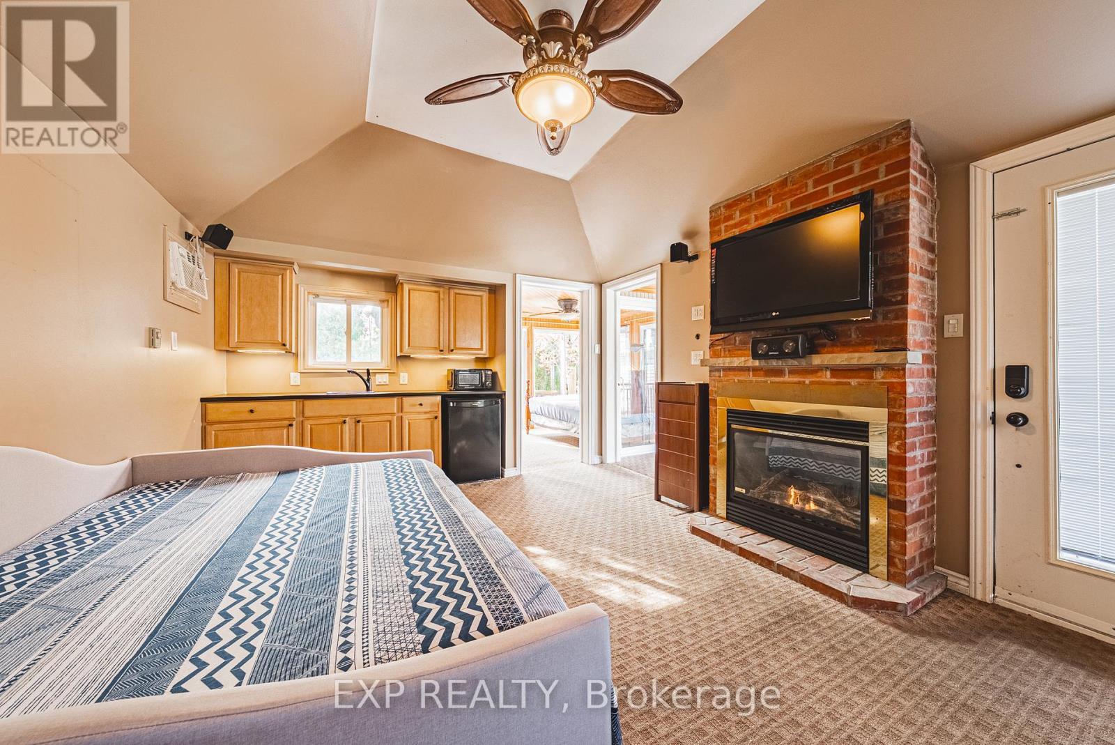1164 Barton Street, Hamilton, ON - Indoor Photo Showing Bedroom With Fireplace