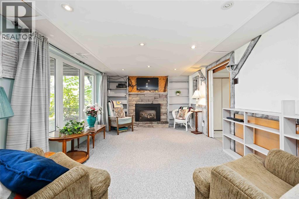 563 Riverside Drive, St Clair, ON - Indoor Photo Showing Living Room With Fireplace