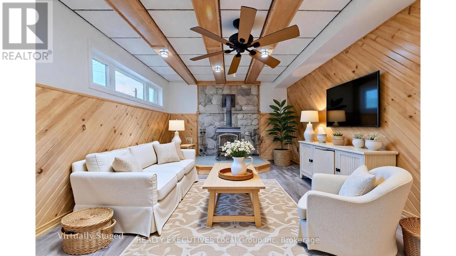 33 Dubeau Street, West Nipissing (Verner), ON - Indoor Photo Showing Living Room With Fireplace