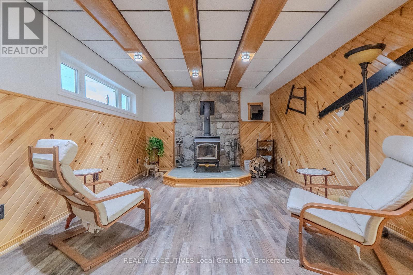 33 Dubeau Street, West Nipissing (Verner), ON - Indoor With Fireplace