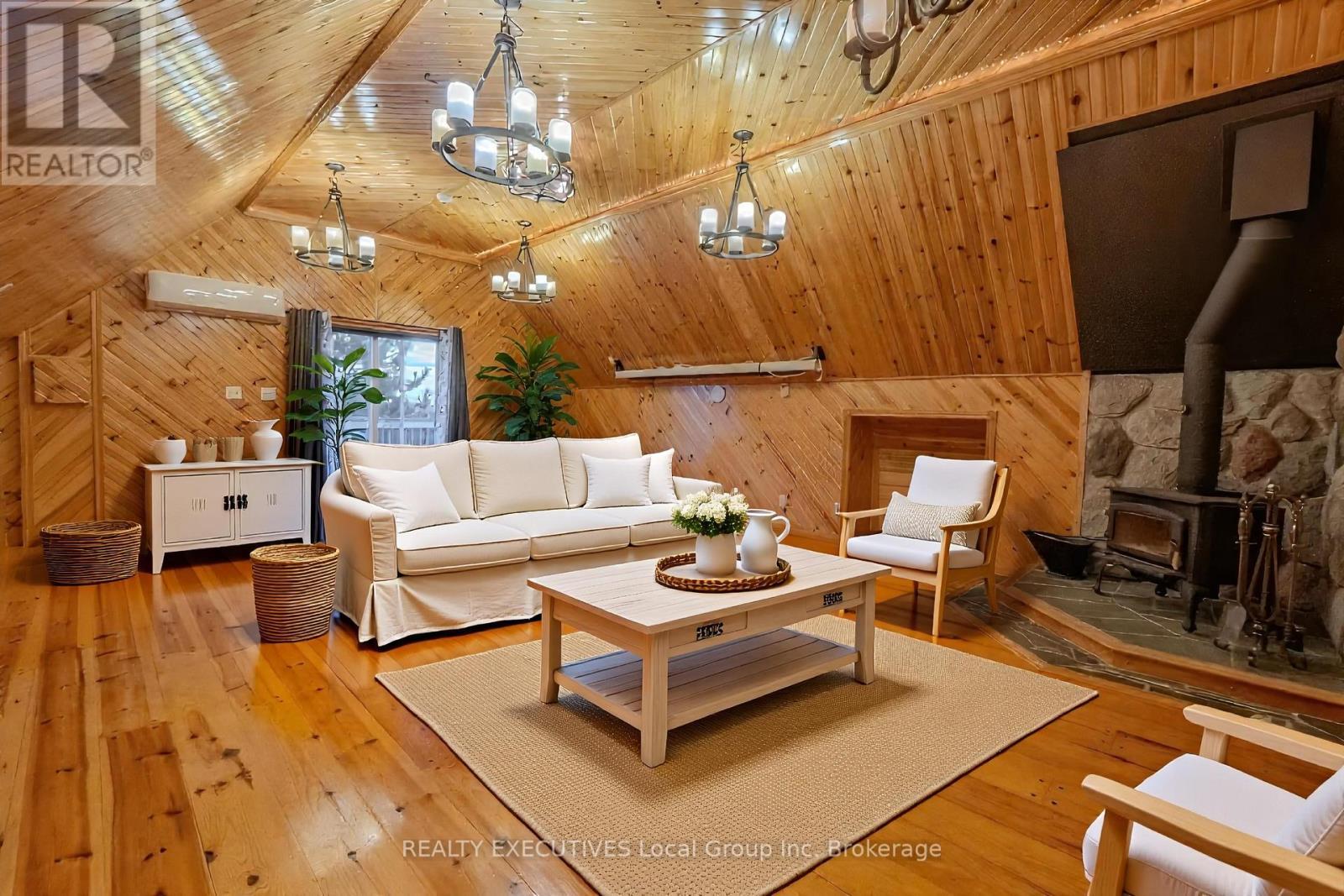 33 Dubeau Street, West Nipissing (Verner), ON - Indoor Photo Showing Living Room With Fireplace