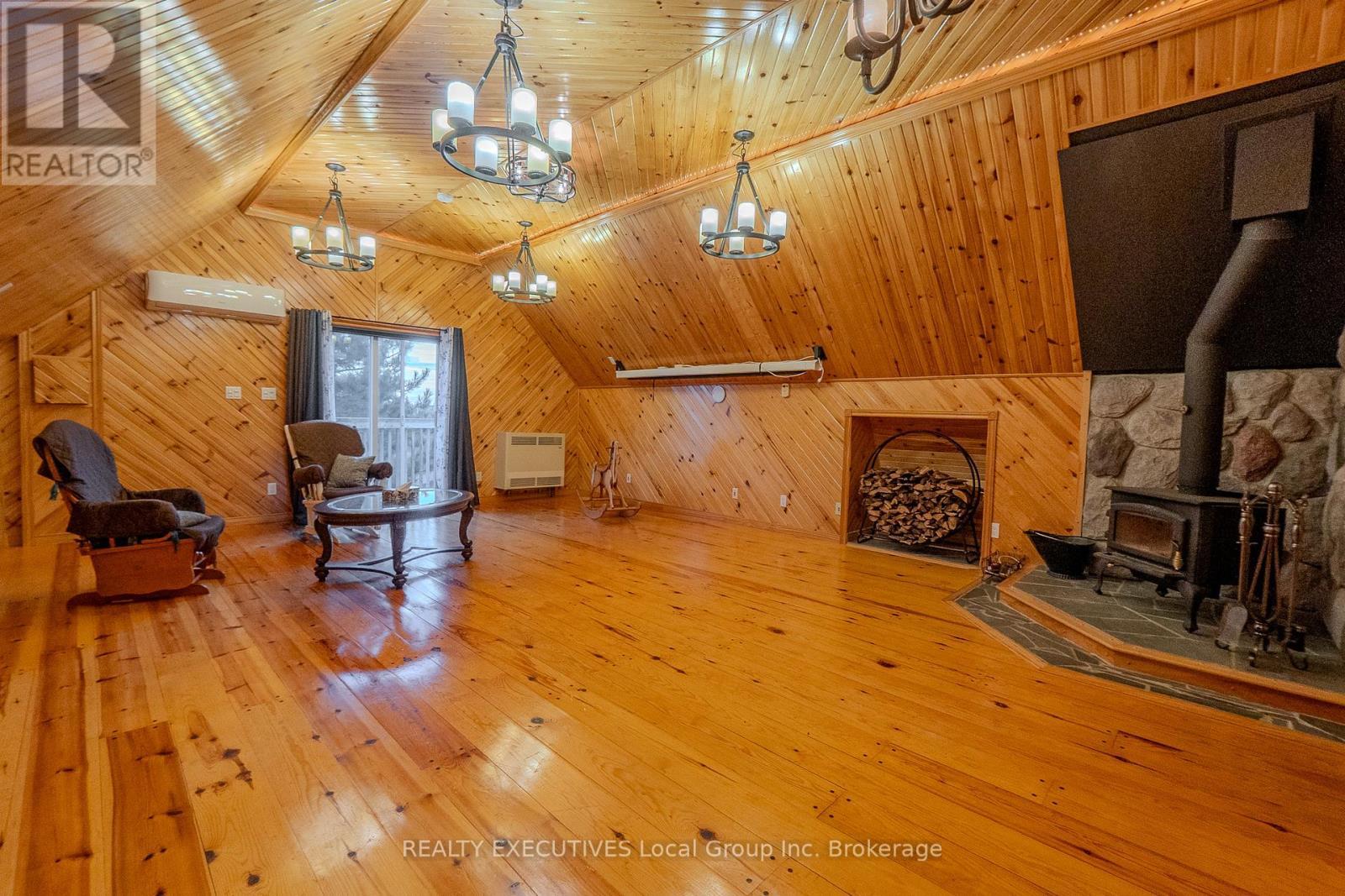 33 Dubeau Street, West Nipissing (Verner), ON - Indoor Photo Showing Other Room With Fireplace