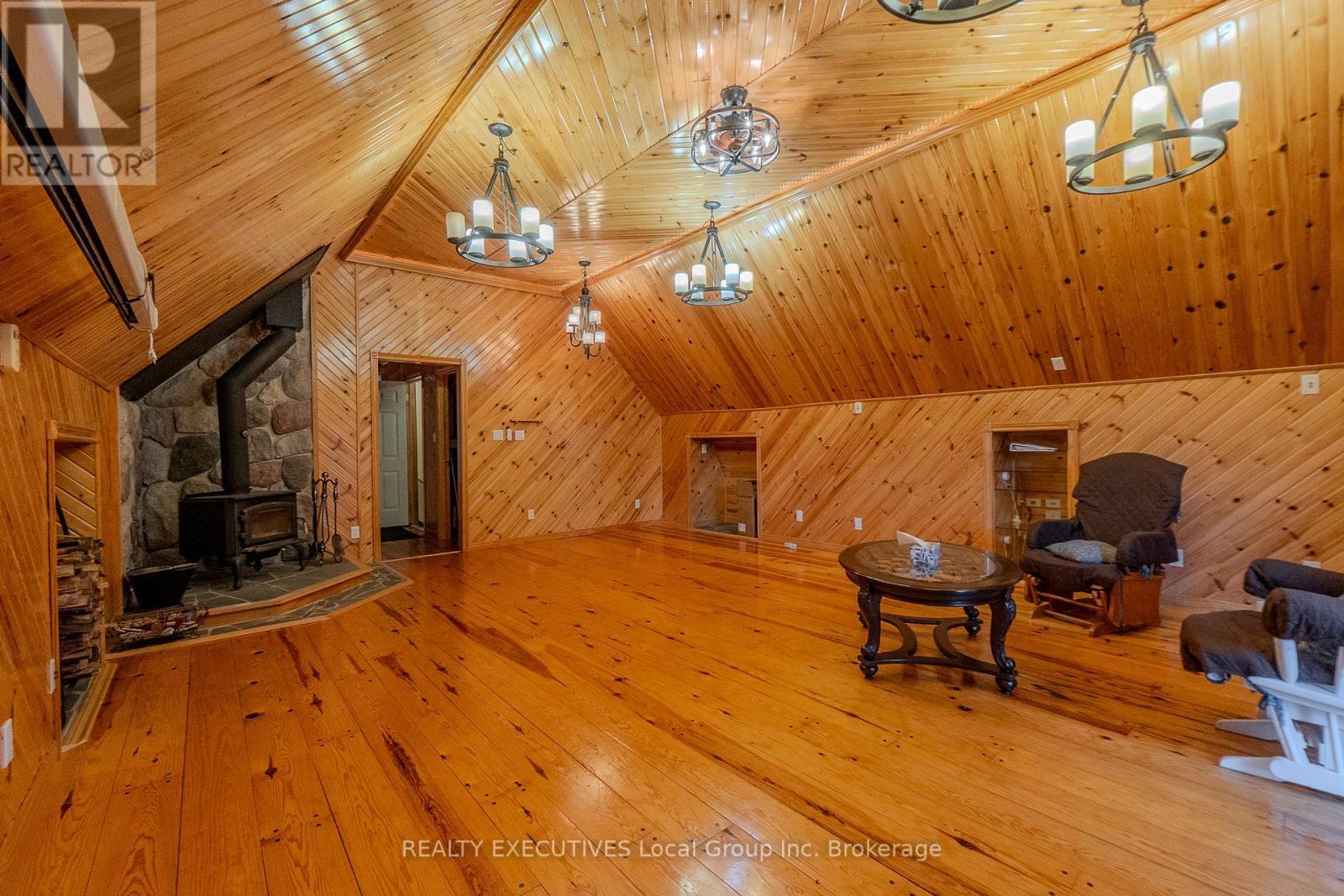 33 Dubeau Street, West Nipissing (Verner), ON - Indoor Photo Showing Other Room With Fireplace