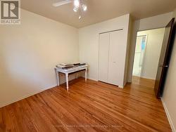 Bedroom 2 with hardwood -