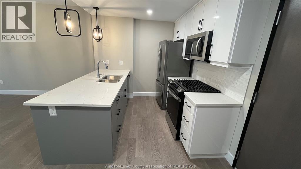 140 Main East Unit# 305, Kingsville, ON - Indoor Photo Showing Kitchen With Double Sink