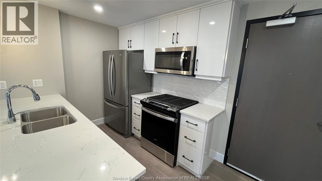 140 Main East Unit# 305, Kingsville, ON - Indoor Photo Showing Kitchen With Stainless Steel Kitchen With Double Sink