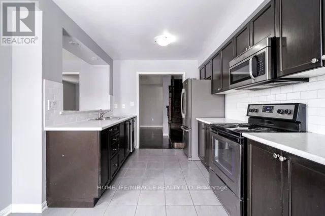 43 Colonel Frank Cheng Crescent, Brampton, ON - Indoor Photo Showing Kitchen With Stainless Steel Kitchen