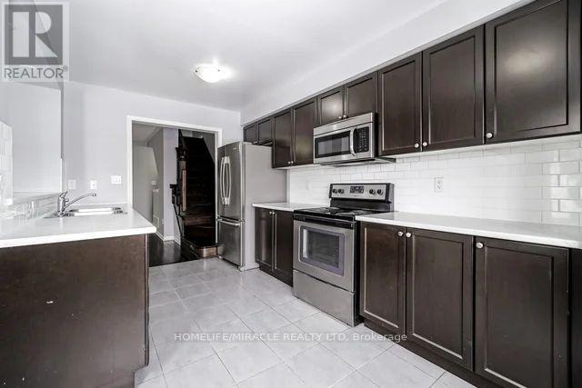 43 Colonel Frank Cheng Crescent, Brampton, ON - Indoor Photo Showing Kitchen With Stainless Steel Kitchen