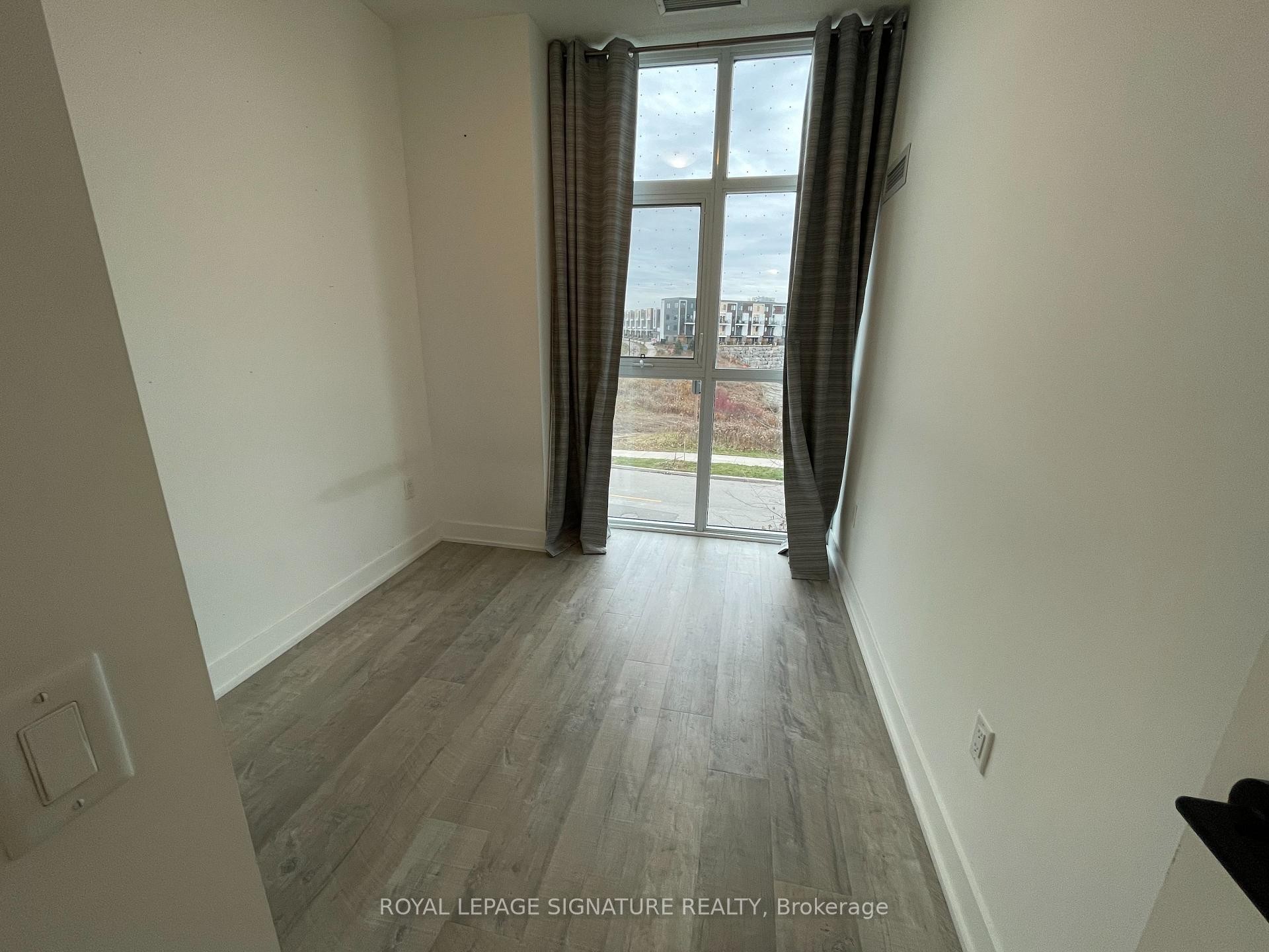 201-60 George Butchart Drive, Toronto, ON - Indoor Photo Showing Other Room