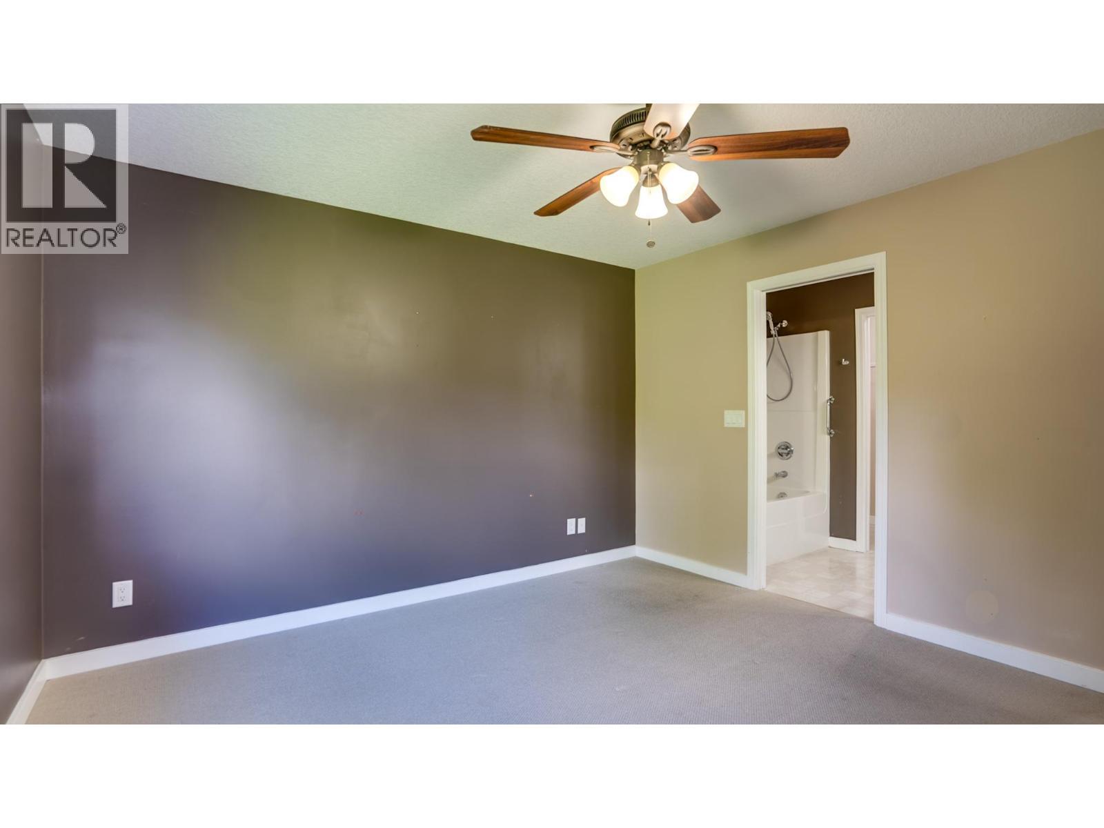 Primary Bedroom - 5200 25Th Avenue, Vernon, BC - Indoor Photo Showing Other Room