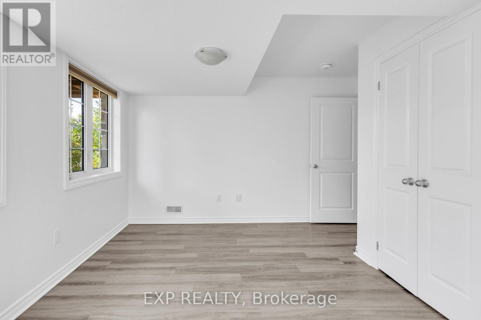 UNSTAGED MASTER BEDROOM - 103 - 5 Cityview Drive S, Guelph, ON - Indoor Photo Showing Other Room