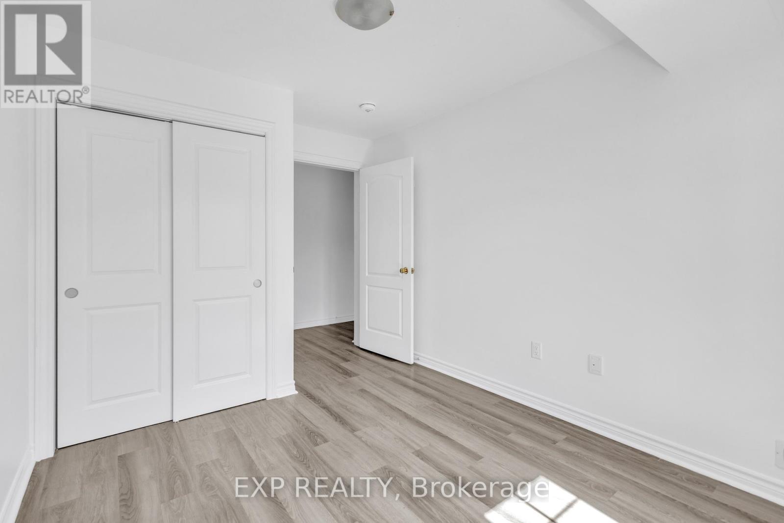 UNSTAGED 3rd BEDROOM - 103 - 5 Cityview Drive S, Guelph, ON - Indoor Photo Showing Other Room