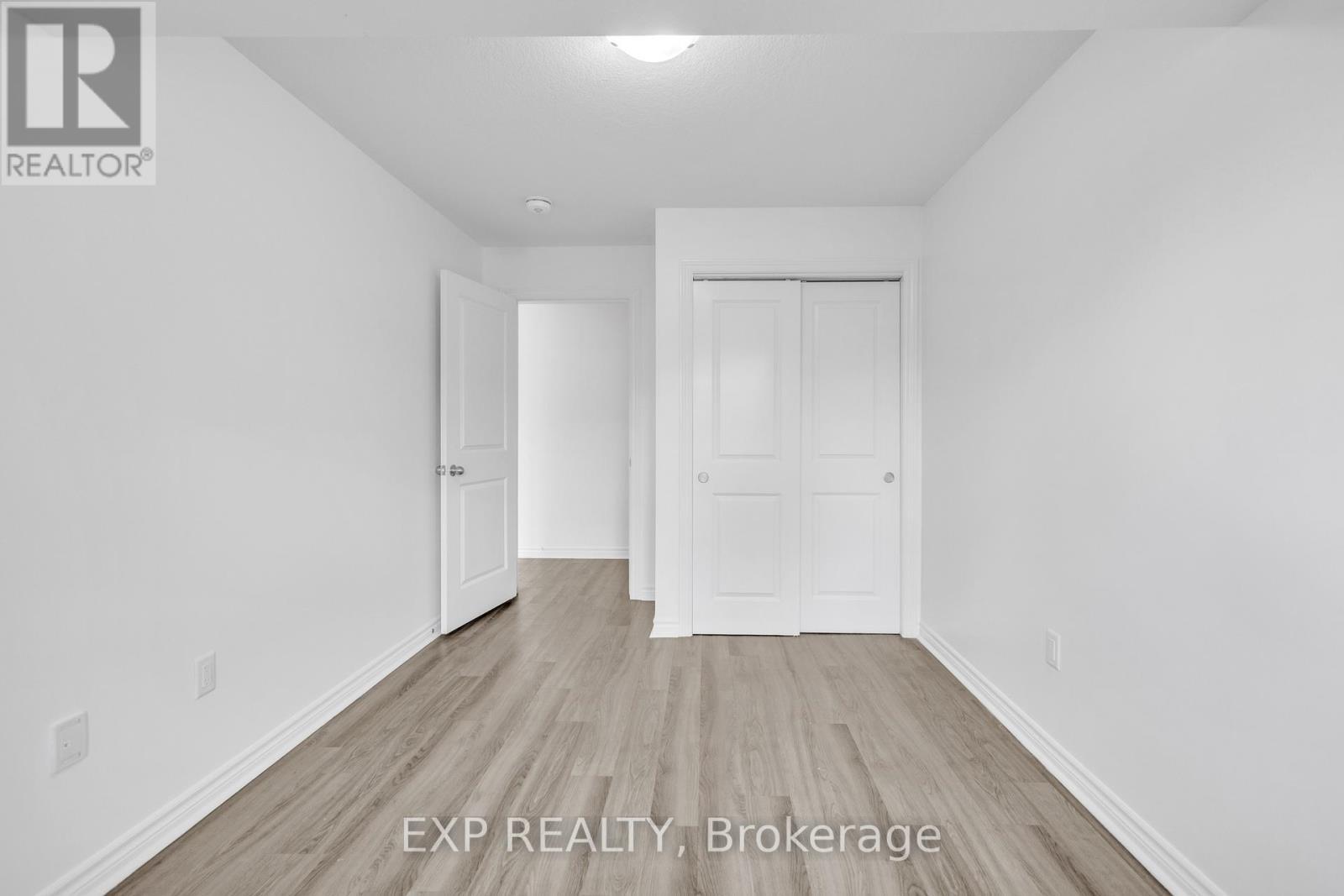 UNSTAGED 3rd BEDROOM - 103 - 5 Cityview Drive S, Guelph, ON - Indoor Photo Showing Other Room