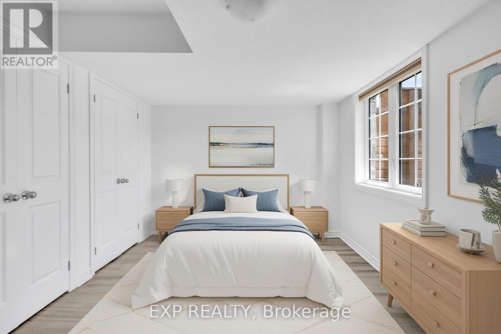 VIRTUALLY STAGED MASTER BEDROOM - 103 - 5 Cityview Drive S, Guelph, ON - Indoor Photo Showing Bedroom