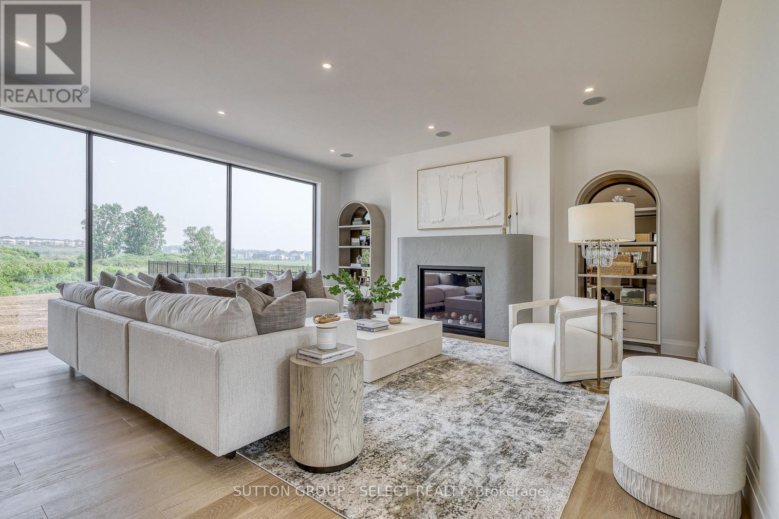 169 Edgewater Boulevard, Middlesex Centre (Kilworth), ON - Indoor Photo Showing Living Room With Fireplace