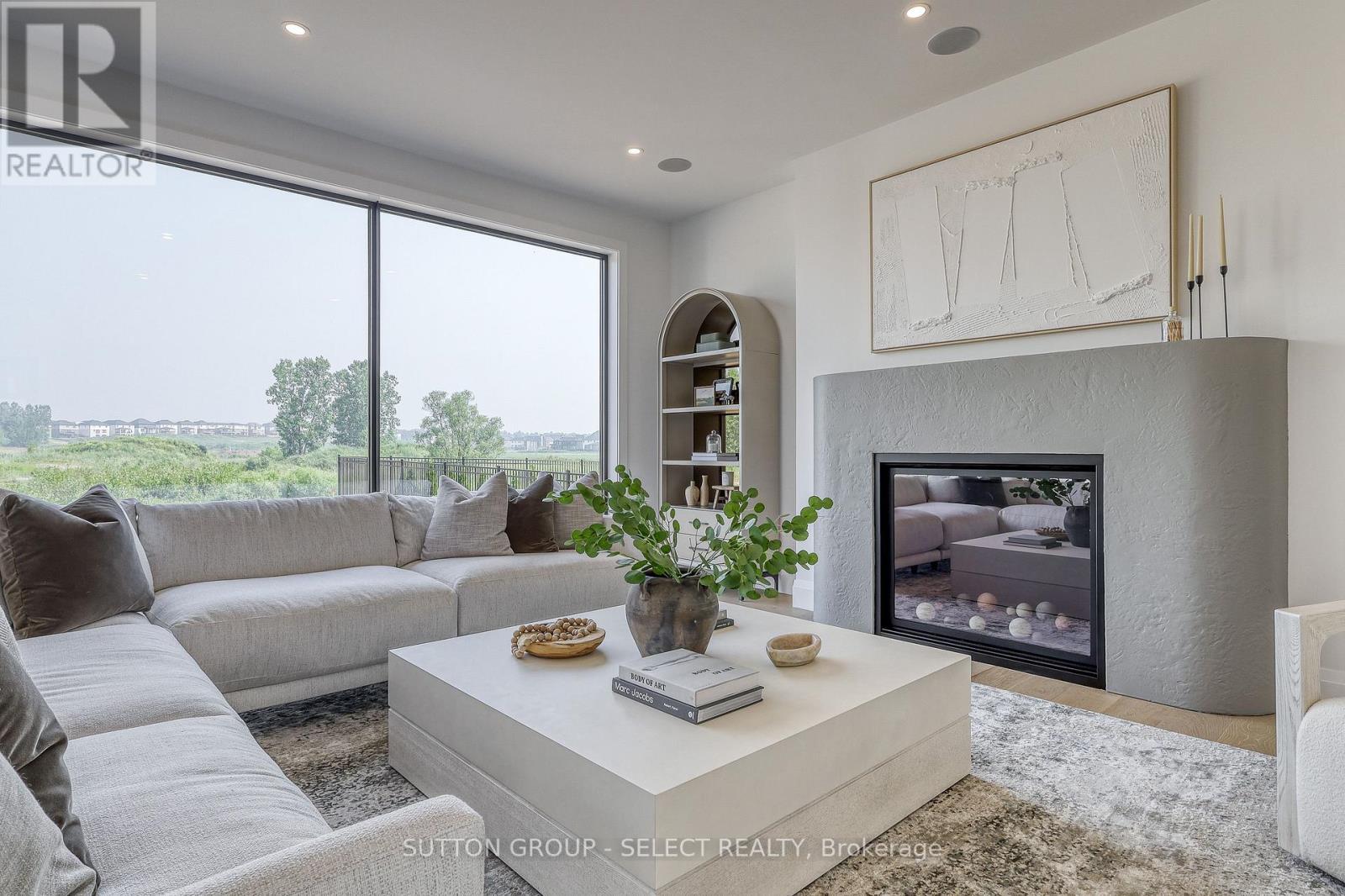 169 Edgewater Boulevard, Middlesex Centre (Kilworth), ON - Indoor Photo Showing Living Room With Fireplace