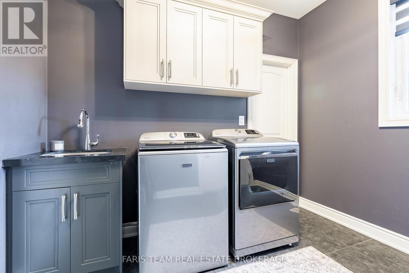 9 Byers Street, Springwater, ON - Indoor Photo Showing Laundry Room