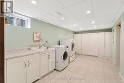 Lower level laundry room with storage -