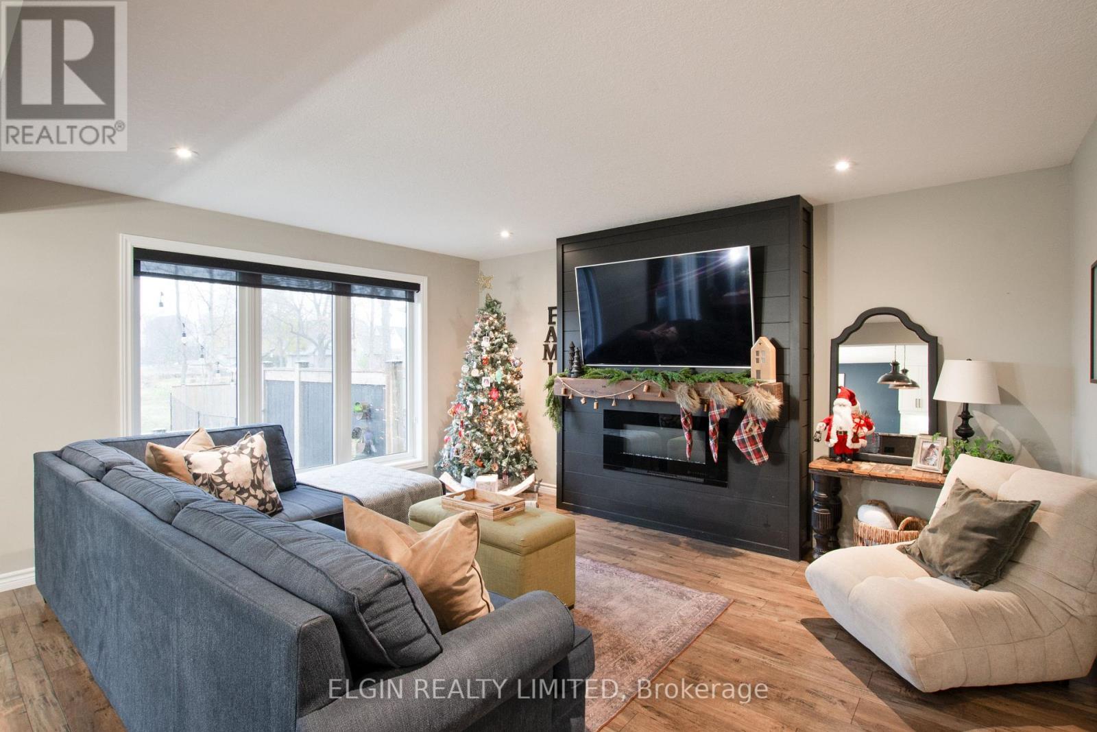 184 Emery Street, Central Elgin, ON - Indoor Photo Showing Living Room With Fireplace