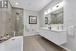 Primary ensuite has quartz two-sink vanity -