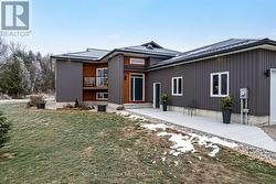 Slate-hued steel siding and top quality steel roof -