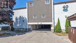 Covered parking entry to garages -