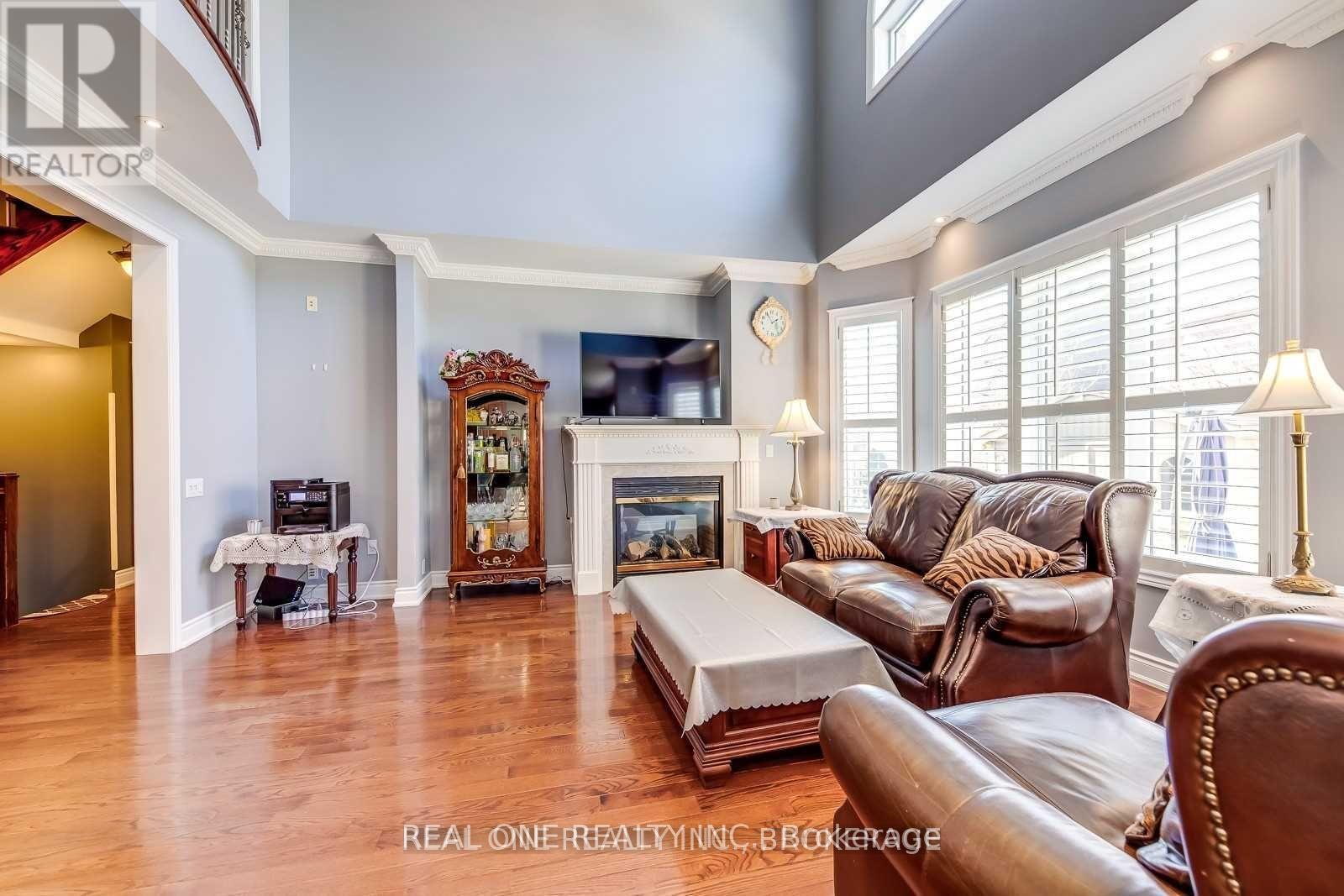 96 Spring Azure Crescent, Oakville, ON - Indoor Photo Showing Living Room With Fireplace