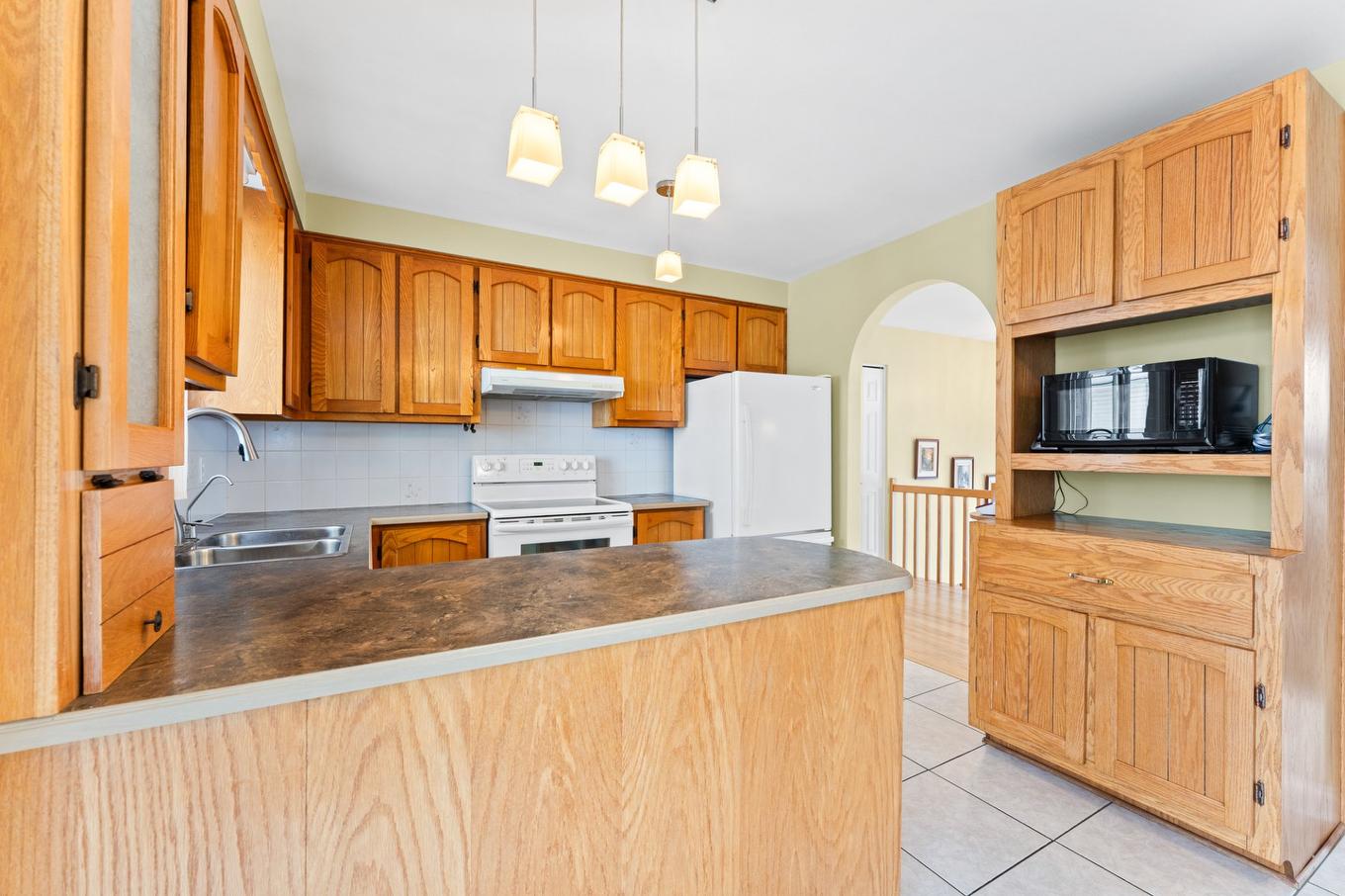 Cuisine - 291 Rue Marceline, Terrebonne (Terrebonne), QC - Indoor Photo Showing Kitchen With Double Sink