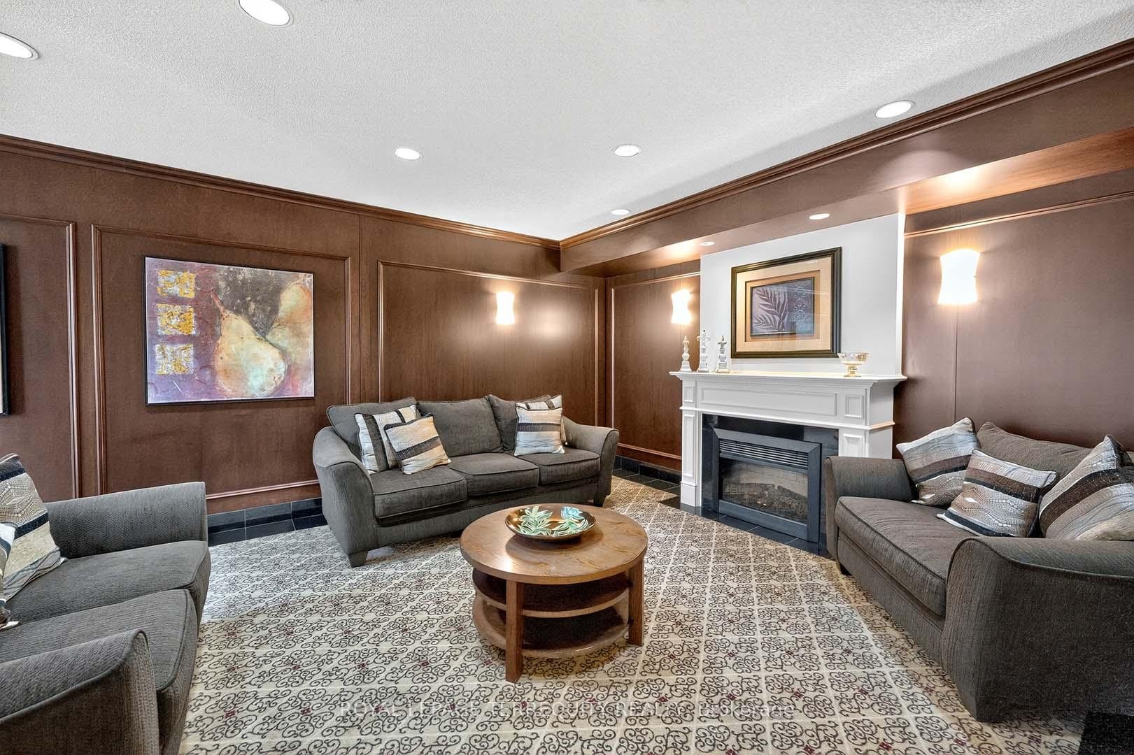 1402-110 Promenade Circle, Vaughan, ON - Indoor Photo Showing Living Room With Fireplace