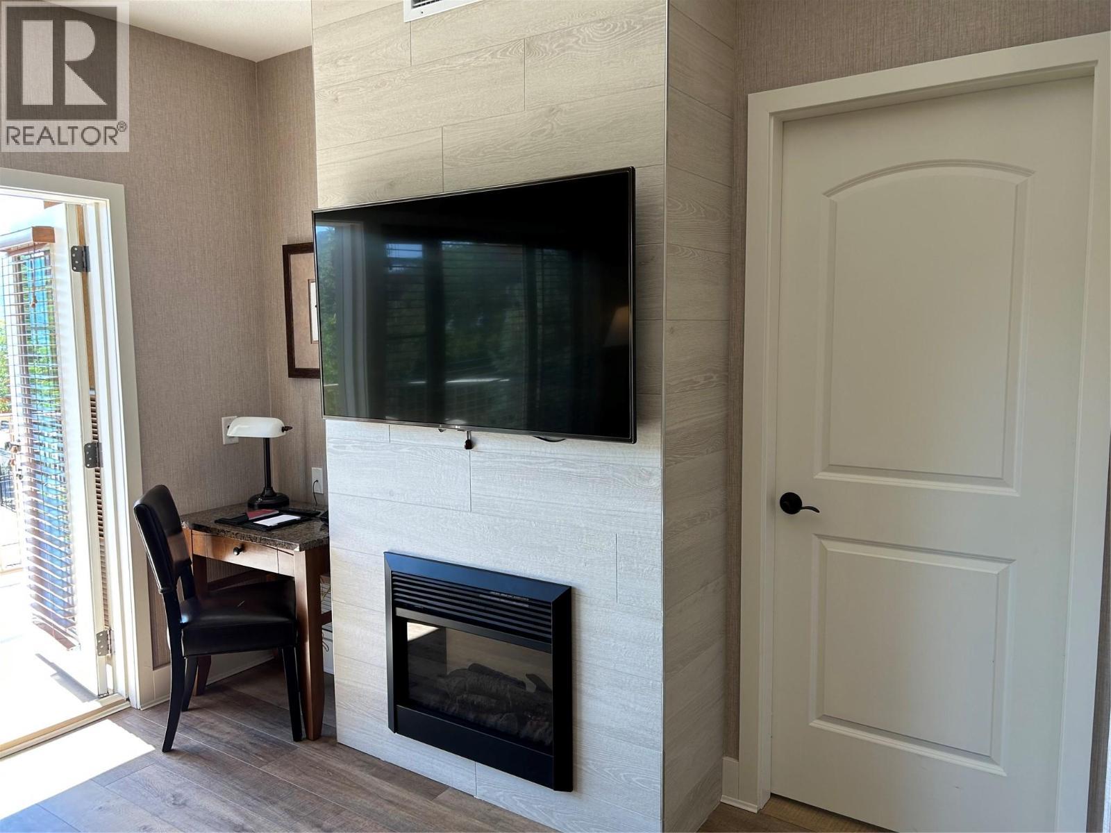 1200 Rancher Creek Road Unit# 131Ab, Osoyoos, BC - Indoor With Fireplace