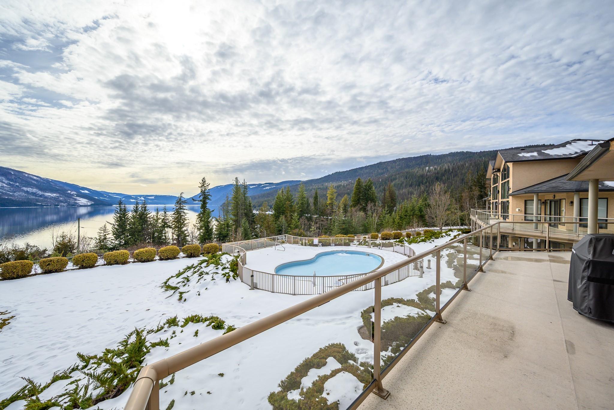202-3473 Lakeview Place, Enderby, BC - Outdoor With In Ground Pool With View